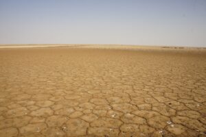 Photo "How does global warming affect society and the economy in different countries?"